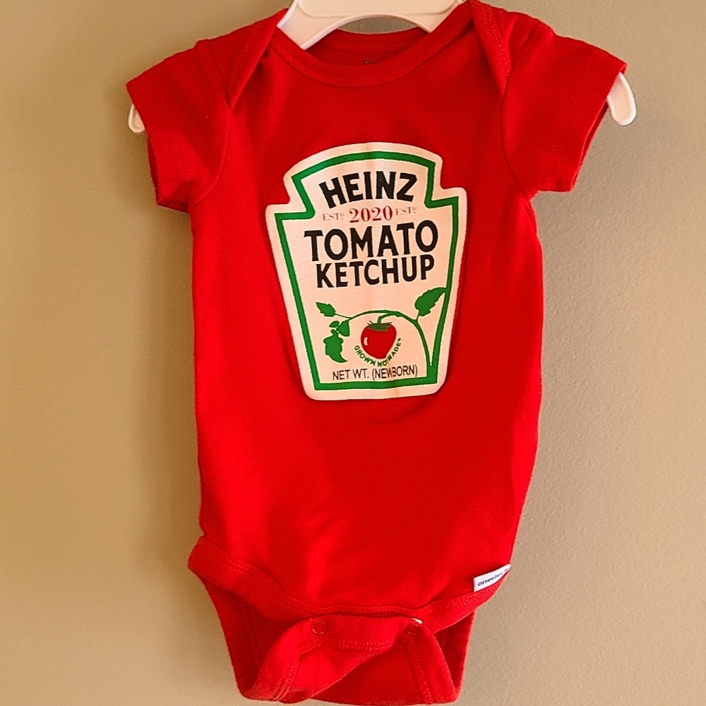 Red short sleeved onesie/bodysuit with Heinz ketchup logo on front
